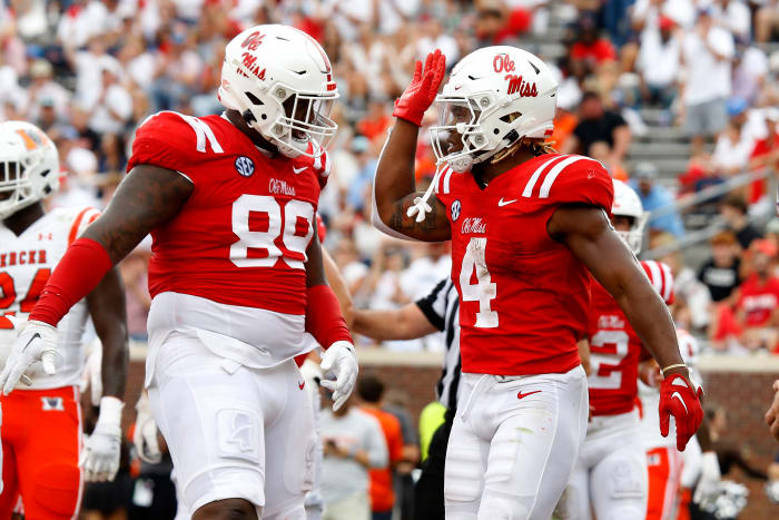 Sep 2, 2023; Oxford, Mississippi, USA; Mississippi Rebels running back Quinshon Judkins (4) reacts with Mississippi Rebels defensive linemen JJ Pegues (89) after a touchdown during the second half against the Mercer Bears at Vaught-Hemingway Stadium. Mandatory Credit: Petre Thomas-USA TODAY Sports
